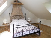 The mezzanine bedroom in the gîte.