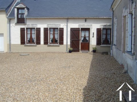 A small, exclusive courtyard to the front will take up to three cars for off road parking.  The house is classical in design for the period and region and is built of tuffeau limestone with an ardoise slate roof.  Renovated within the last 10 years the property benefits from being in extremely good condition and it has all the facilities of a modern home including double glazing throughout.