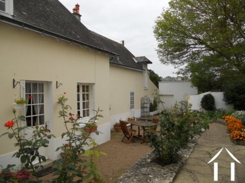 Above the maison d'amis (apartment) there is a large loft (grenier) that could easily extend the B&B accommodation to add a further 2/3 ensuite bedrooms.  This pic shows the full length of the building that includes the large laundry room, workshop and double garage.