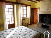The master bedroom is to the front of the property and has a feature fireplace (woodburner is included) exposed stone features around the windows and doors plus oak beams.  It has an ensuite bathroom.