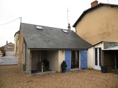 Built originally in tuffeau limestone, the house has been extended during its renovation and benefits from having a new ardoise slate roof. The main entrance to the property is to the rear (through the French double doors seen in this picture