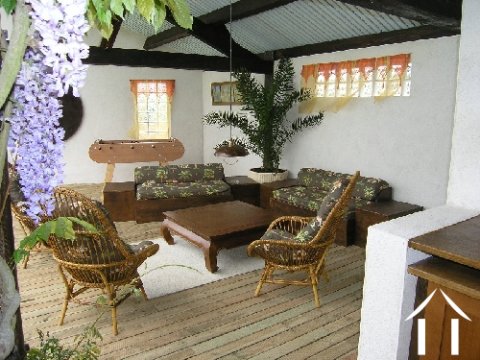 Uitbouw leefruimte met bedekt terras