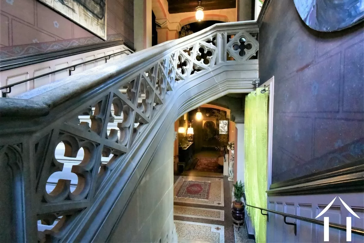 Grand stone staircase to the first floor