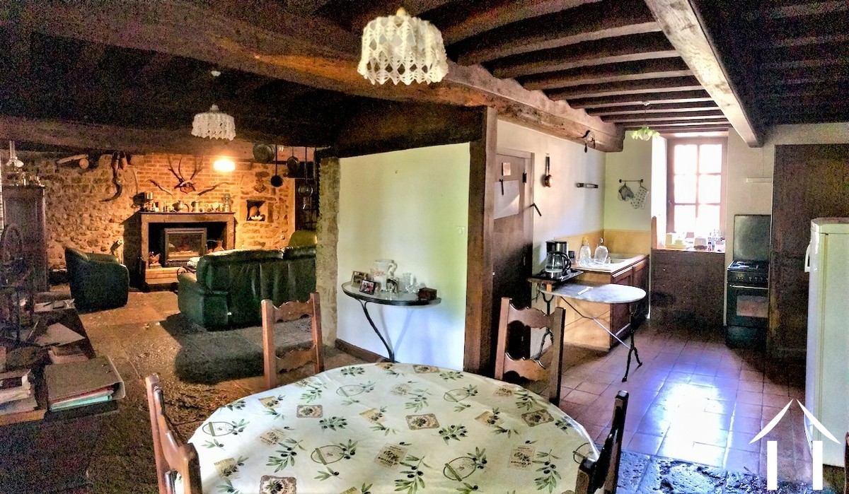 Overzicht van woonkamer, eetkamer en keuken