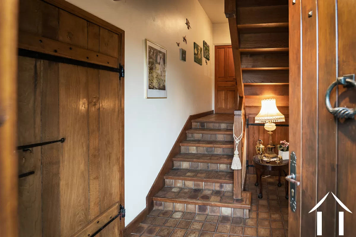 L'entrée. A gauche, la buanderie/chaufferieL'entrée. A gauche, la buanderie/chaufferie