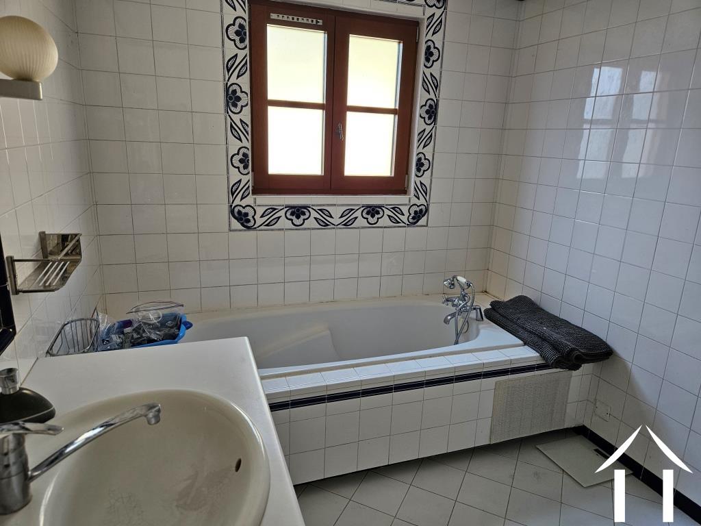 Bathroom with shower and wash basin