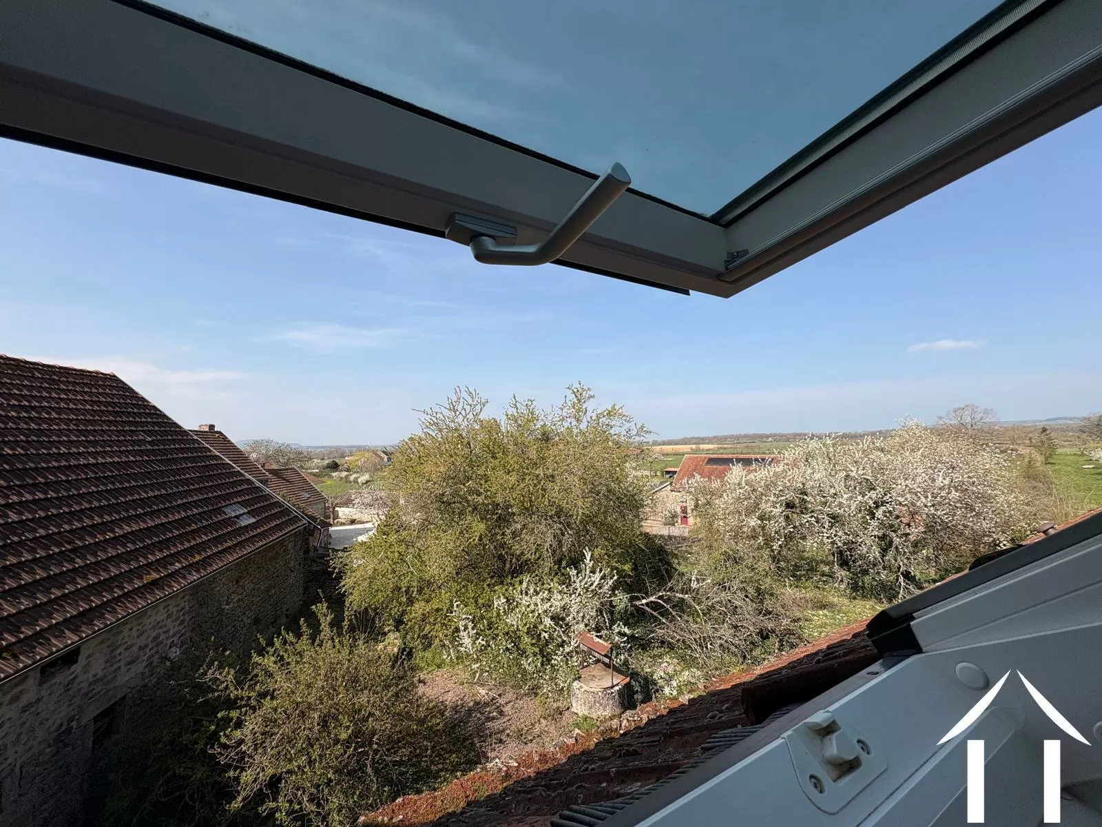 Uitzicht vanaf het dakraam van de master slaapkamer