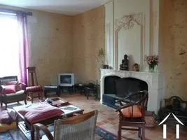 Woonkamer met open haard