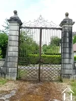 main gate with the original wrought iron gates