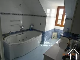 Bathroom with jacuzzi bath