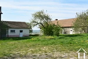 smaller outbuildings between the stable and the house