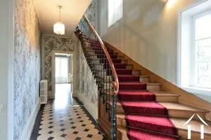 grand staircase to the upper floor
