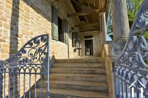 stone steps to the enclosed Maconnais balcony