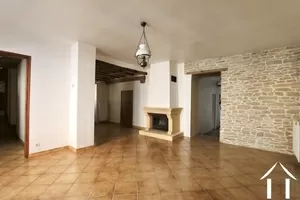 L shaped dining room with fireplace