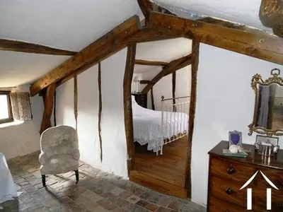 De ouderslaapkamer met eigen lounge. Achte de slaapkamer is het grote loft-atelier met ruimte voor een extra slaapkamer.