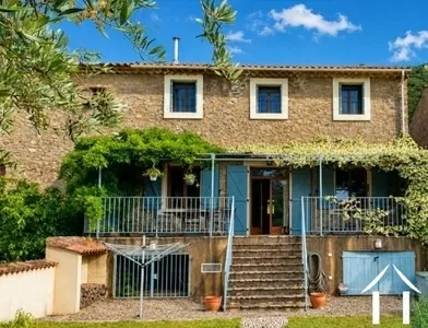 In Roquebrun, a beautifully renovated former wine cellar with pool and views, close to the restaurants and the river beach. Ref # EG09-6990 