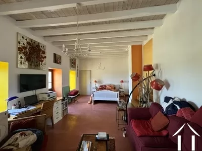 Livingroom currently in use as office and sleepingroom