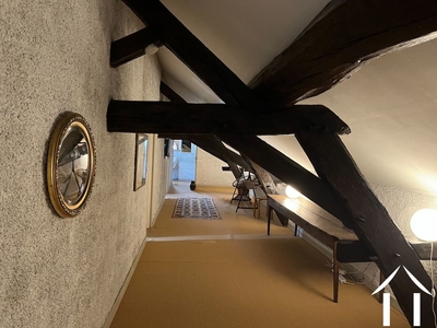 Gang die 3 slaapkamers en een badkamer met WC verbindt